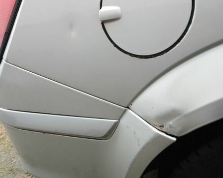 Серый Опель Астра, объемом двигателя 1.2 л и пробегом 306 тыс. км за 3600 $, фото 6 на Automoto.ua