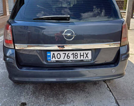 Серый Опель Астра, объемом двигателя 1.9 л и пробегом 293 тыс. км за 3900 $, фото 19 на Automoto.ua
