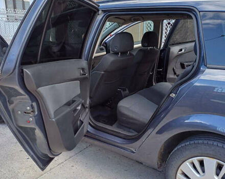 Серый Опель Астра, объемом двигателя 1.9 л и пробегом 293 тыс. км за 3900 $, фото 2 на Automoto.ua