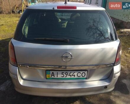 Серый Опель Астра, объемом двигателя 1.3 л и пробегом 277 тыс. км за 4500 $, фото 4 на Automoto.ua