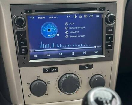 Серый Опель Астра, объемом двигателя 1.6 л и пробегом 160 тыс. км за 5400 $, фото 61 на Automoto.ua