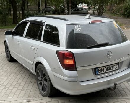 Серый Опель Астра, объемом двигателя 1.7 л и пробегом 228 тыс. км за 5600 $, фото 3 на Automoto.ua