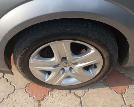 Серый Опель Астра, объемом двигателя 1.3 л и пробегом 239 тыс. км за 4700 $, фото 6 на Automoto.ua