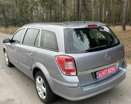 Серый Опель Астра, объемом двигателя 1.4 л и пробегом 193 тыс. км за 4900 $, фото 7 на Automoto.ua