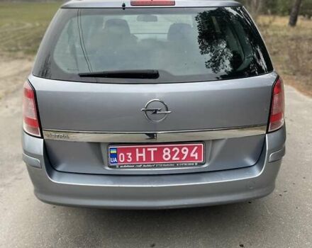 Серый Опель Астра, объемом двигателя 1.4 л и пробегом 193 тыс. км за 4900 $, фото 3 на Automoto.ua