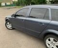 Серый Опель Астра, объемом двигателя 1.7 л и пробегом 428 тыс. км за 4200 $, фото 2 на Automoto.ua