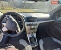 Серый Опель Астра, объемом двигателя 1.7 л и пробегом 289 тыс. км за 4000 $, фото 9 на Automoto.ua