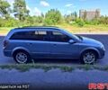 Серый Опель Астра, объемом двигателя 1.2 л и пробегом 490 тыс. км за 5000 $, фото 6 на Automoto.ua