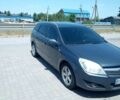Серый Опель Астра, объемом двигателя 1.4 л и пробегом 230 тыс. км за 4950 $, фото 2 на Automoto.ua