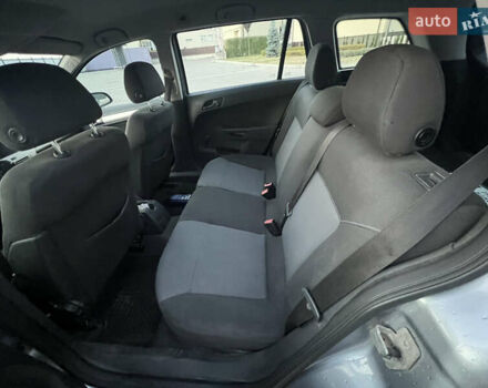 Серый Опель Астра, объемом двигателя 1.6 л и пробегом 234 тыс. км за 5700 $, фото 20 на Automoto.ua