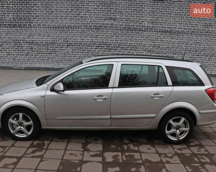 Серый Опель Астра, объемом двигателя 1.69 л и пробегом 239 тыс. км за 4999 $, фото 2 на Automoto.ua