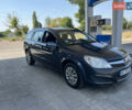 Сірий Опель Астра, об'ємом двигуна 1.7 л та пробігом 251 тис. км за 5000 $, фото 4 на Automoto.ua
