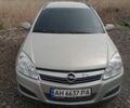 Серый Опель Астра, объемом двигателя 1.4 л и пробегом 240 тыс. км за 5000 $, фото 1 на Automoto.ua