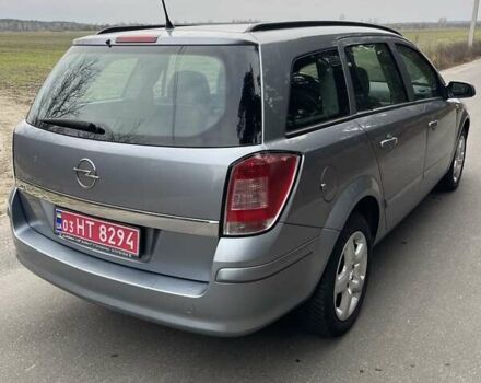 Серый Опель Астра, объемом двигателя 1.4 л и пробегом 193 тыс. км за 4900 $, фото 6 на Automoto.ua