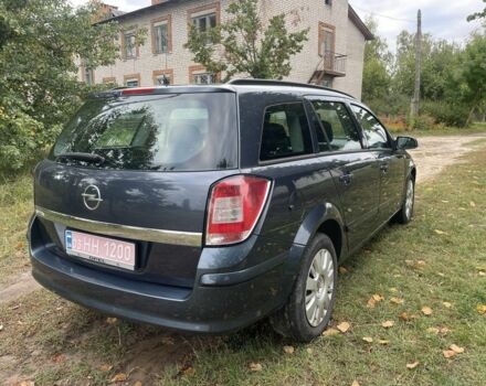 Серый Опель Астра, объемом двигателя 1.4 л и пробегом 224 тыс. км за 5500 $, фото 4 на Automoto.ua