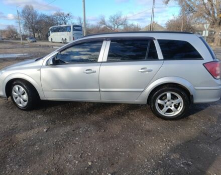 Серый Опель Астра, объемом двигателя 1.2 л и пробегом 210 тыс. км за 5600 $, фото 3 на Automoto.ua