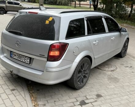 Серый Опель Астра, объемом двигателя 1.7 л и пробегом 228 тыс. км за 5600 $, фото 4 на Automoto.ua