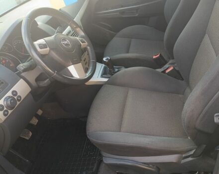 Серый Опель Астра, объемом двигателя 1.2 л и пробегом 210 тыс. км за 5600 $, фото 7 на Automoto.ua