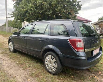 Серый Опель Астра, объемом двигателя 1.4 л и пробегом 224 тыс. км за 5500 $, фото 3 на Automoto.ua