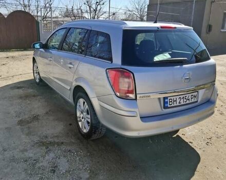 Серый Опель Астра, объемом двигателя 1.7 л и пробегом 290 тыс. км за 5500 $, фото 9 на Automoto.ua