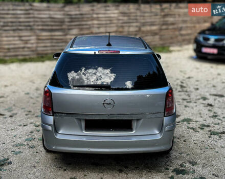 Серый Опель Астра, объемом двигателя 1.6 л и пробегом 210 тыс. км за 5500 $, фото 19 на Automoto.ua