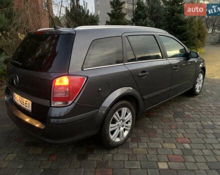 Серый Опель Астра, объемом двигателя 1.69 л и пробегом 294 тыс. км за 5000 $, фото 9 на Automoto.ua