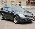 Серый Опель Астра, объемом двигателя 1.4 л и пробегом 281 тыс. км за 5140 $, фото 11 на Automoto.ua