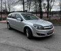 Серый Опель Астра, объемом двигателя 1.9 л и пробегом 222 тыс. км за 5990 $, фото 2 на Automoto.ua