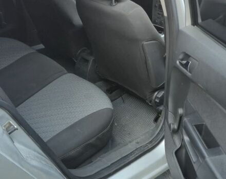 Серый Опель Астра, объемом двигателя 1 л и пробегом 303 тыс. км за 5500 $, фото 10 на Automoto.ua