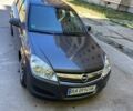 Серый Опель Астра, объемом двигателя 1.4 л и пробегом 213 тыс. км за 5800 $, фото 1 на Automoto.ua