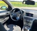 Серый Опель Астра, объемом двигателя 1.4 л и пробегом 213 тыс. км за 5800 $, фото 7 на Automoto.ua