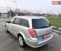 Серый Опель Астра, объемом двигателя 1.6 л и пробегом 229 тыс. км за 6000 $, фото 10 на Automoto.ua