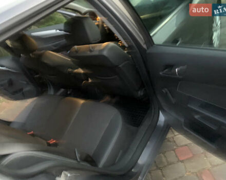 Серый Опель Астра, объемом двигателя 1.69 л и пробегом 294 тыс. км за 5000 $, фото 14 на Automoto.ua