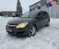Серый Опель Астра, объемом двигателя 1.4 л и пробегом 207 тыс. км за 4990 $, фото 3 на Automoto.ua
