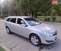 Серый Опель Астра, объемом двигателя 1.6 л и пробегом 226 тыс. км за 6400 $, фото 8 на Automoto.ua