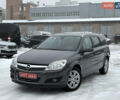 Серый Опель Астра, объемом двигателя 1.8 л и пробегом 246 тыс. км за 6999 $, фото 1 на Automoto.ua