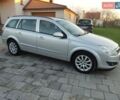 Серый Опель Астра, объемом двигателя 1.6 л и пробегом 240 тыс. км за 5550 $, фото 11 на Automoto.ua