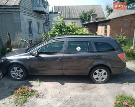 Серый Опель Астра, объемом двигателя 1.6 л и пробегом 210 тыс. км за 5500 $, фото 2 на Automoto.ua