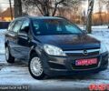 Серый Опель Астра, объемом двигателя 1.6 л и пробегом 20800 тыс. км за 5599 $, фото 1 на Automoto.ua