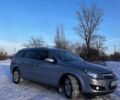 Серый Опель Астра, объемом двигателя 1.9 л и пробегом 298 тыс. км за 5400 $, фото 1 на Automoto.ua