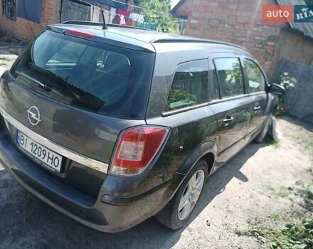 Серый Опель Астра, объемом двигателя 1.6 л и пробегом 210 тыс. км за 5500 $, фото 4 на Automoto.ua