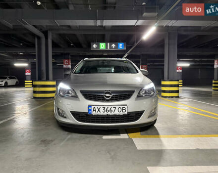 Серый Опель Астра, объемом двигателя 1.4 л и пробегом 243 тыс. км за 7800 $, фото 1 на Automoto.ua