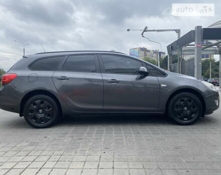 Серый Опель Астра, объемом двигателя 1.4 л и пробегом 230 тыс. км за 7000 $, фото 7 на Automoto.ua