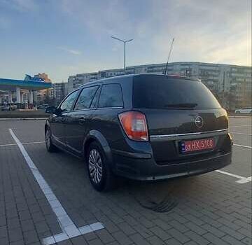 Серый Опель Астра, объемом двигателя 1.6 л и пробегом 173 тыс. км за 6550 $, фото 6 на Automoto.ua