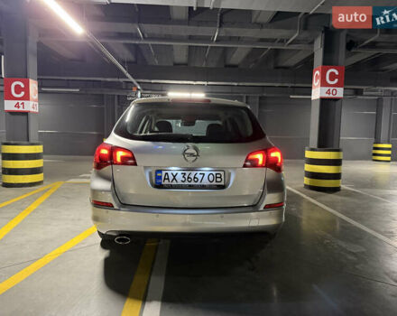 Серый Опель Астра, объемом двигателя 1.4 л и пробегом 243 тыс. км за 7800 $, фото 5 на Automoto.ua