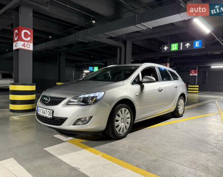 Серый Опель Астра, объемом двигателя 1.4 л и пробегом 243 тыс. км за 7800 $, фото 2 на Automoto.ua