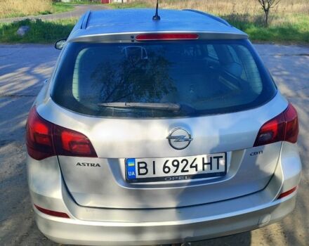 Серый Опель Астра, объемом двигателя 1.7 л и пробегом 249 тыс. км за 7100 $, фото 2 на Automoto.ua