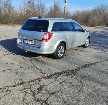 Серый Опель Астра, объемом двигателя 1.6 л и пробегом 260 тыс. км за 5000 $, фото 12 на Automoto.ua