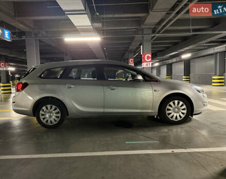 Серый Опель Астра, объемом двигателя 1.4 л и пробегом 243 тыс. км за 7800 $, фото 7 на Automoto.ua