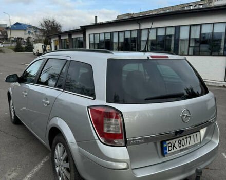 Серый Опель Астра, объемом двигателя 1.69 л и пробегом 320 тыс. км за 5800 $, фото 4 на Automoto.ua